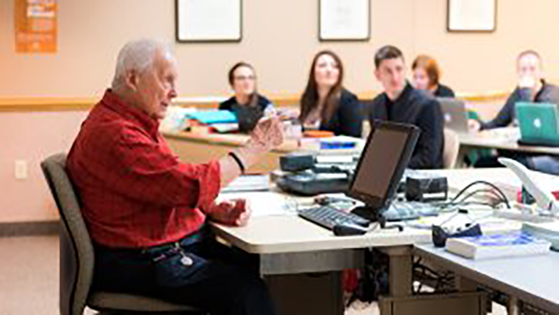 Professor Douglas E. Heidenreich teaching a class