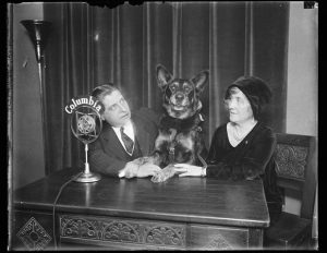 Thomas Schall, his guide dog, and an unidentified woman