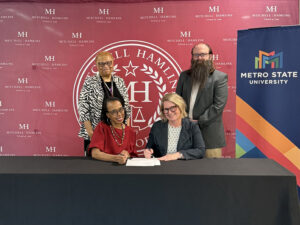 Mitchell Hamline President and Dean Camille Davidson and Director of Culture and Inclusion Sharon Van Leer with Metro State University Provost and Executive Vice President for Academic Affairs Amy Gort and Dean of the College of Individualized Studies Charles Tedder.
