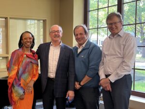 From left, President and Dean Camille M. Davidson, Trustee Emeritus Frank Harris '75, Board Chair Brian Batzli '85, and Gregory L. Buck '87, outgoing chair