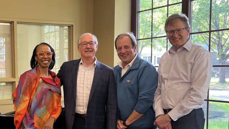 From left, President and Dean Camille M. Davidson, Trustee Emeritus Frank Harris '75, Board Chair Brian Batzli '85, and Gregory L. Buck '87, outgoing chair