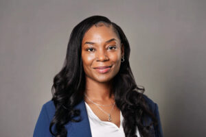 Headshot of Ebra Brock, who is an alumna who graduated in 2026