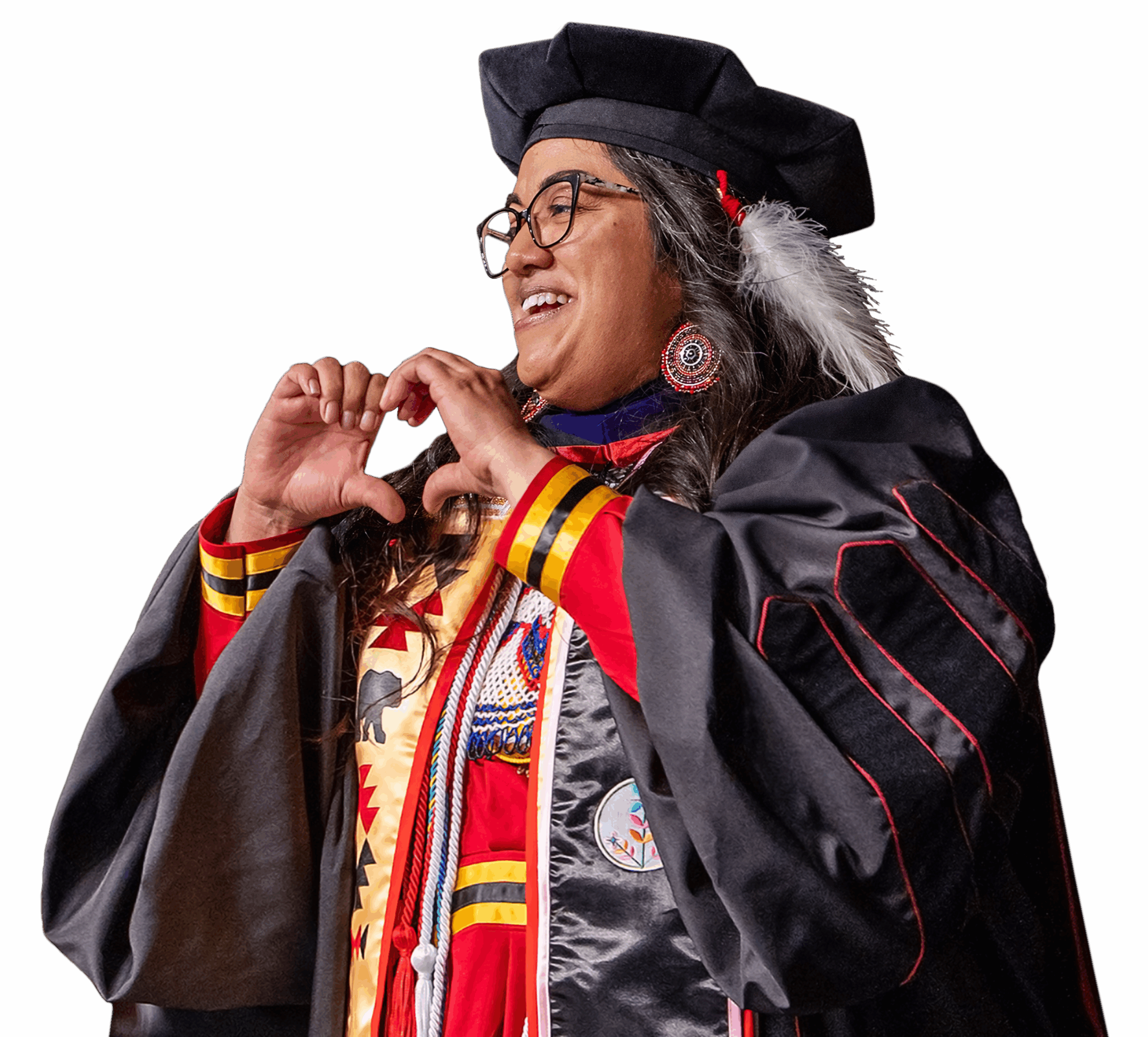 Woman with graduation gown forming a heart with her hands